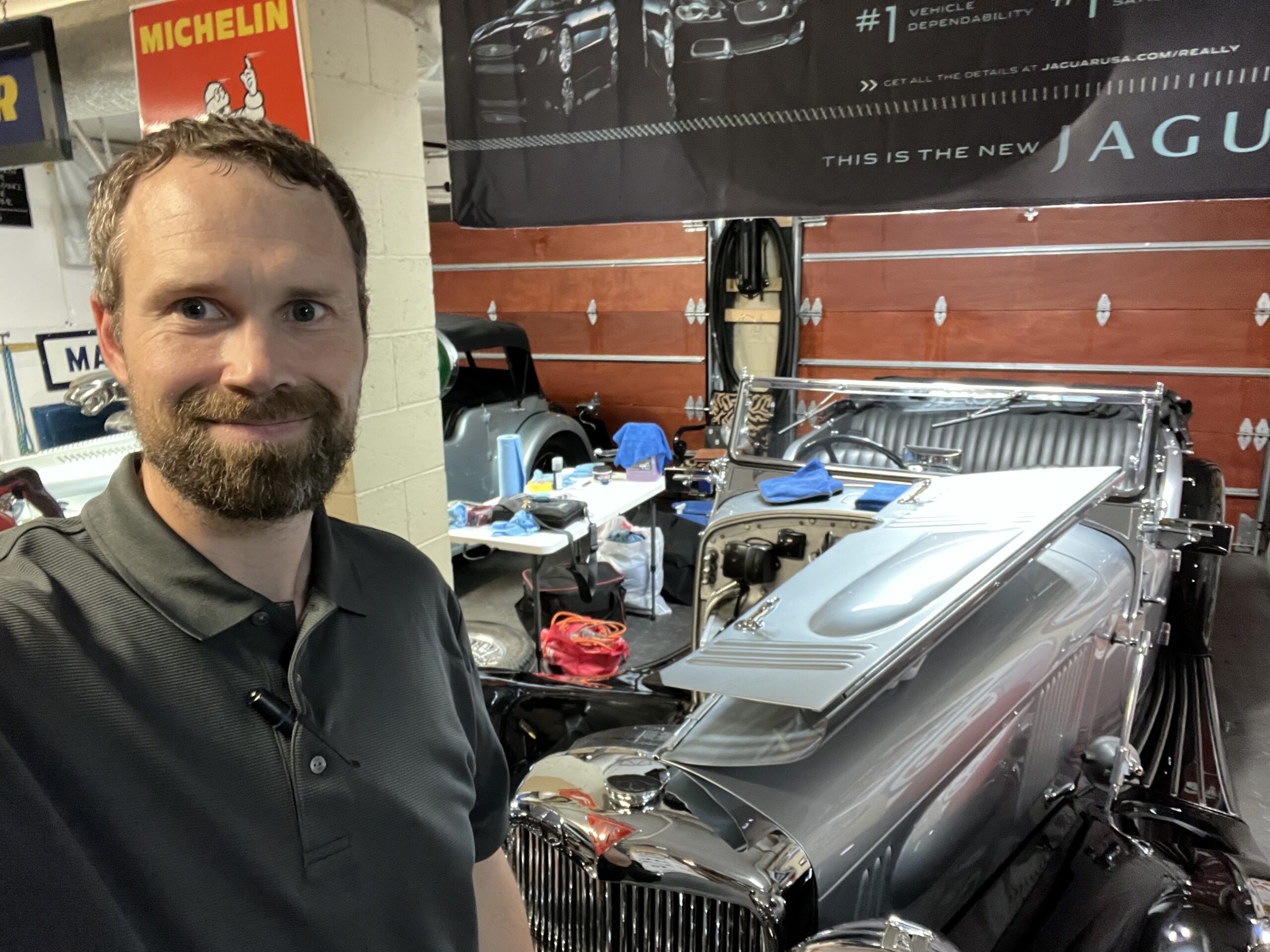 Stephen Wines, standing with an Alvis Speed 25